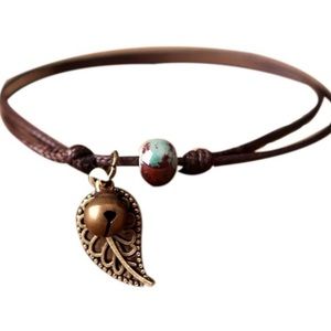 Leather rope bracelet green bead ceramic